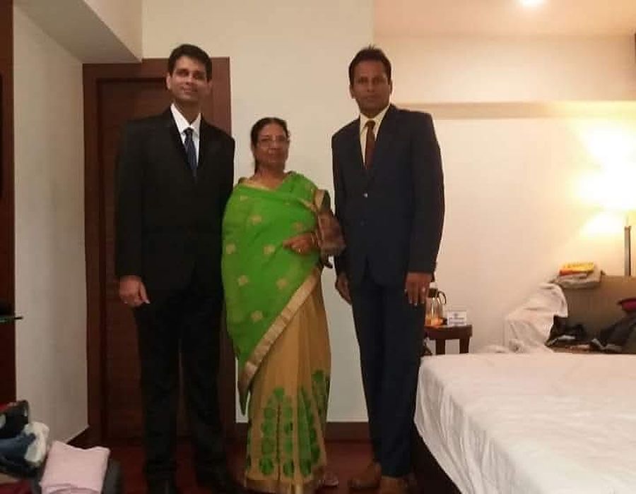 With a client family at their residence