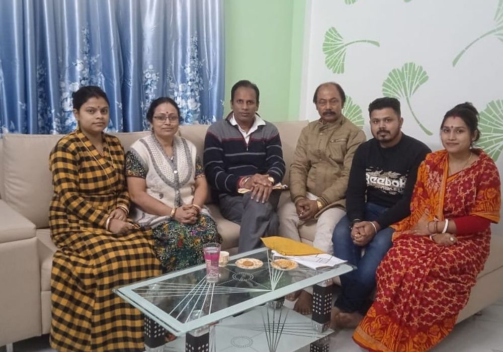 Family consultation session at a client home