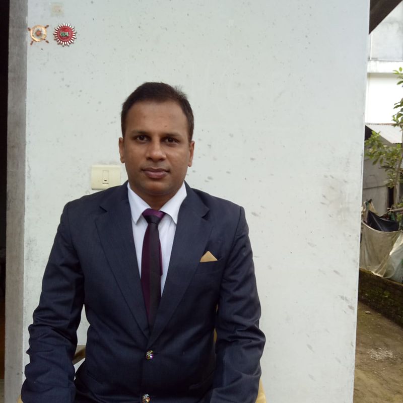 Shri Jay Agarwal in formal attire